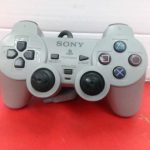 MANETTE PLAYSTATION 1 / GRIS