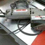 SABLEUSE DE PROFIL / GRIS