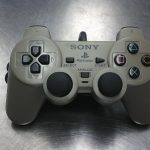 MANETTE PLAYSTATION 1 / GRIS