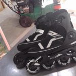 PATIN A ROUES ALIGNEES / NOIR