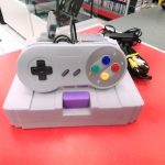CONSOLE DE JEU / GRIS